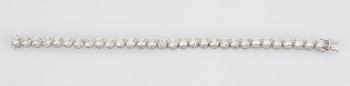 An 18K white gold bracelet set with round brilliant-cut diamonds with a total weight of ca 12.00 cts.