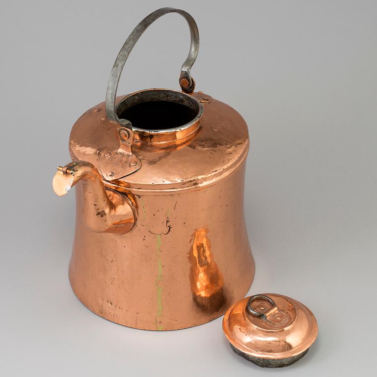A 19th century copper pot with lid and handle.