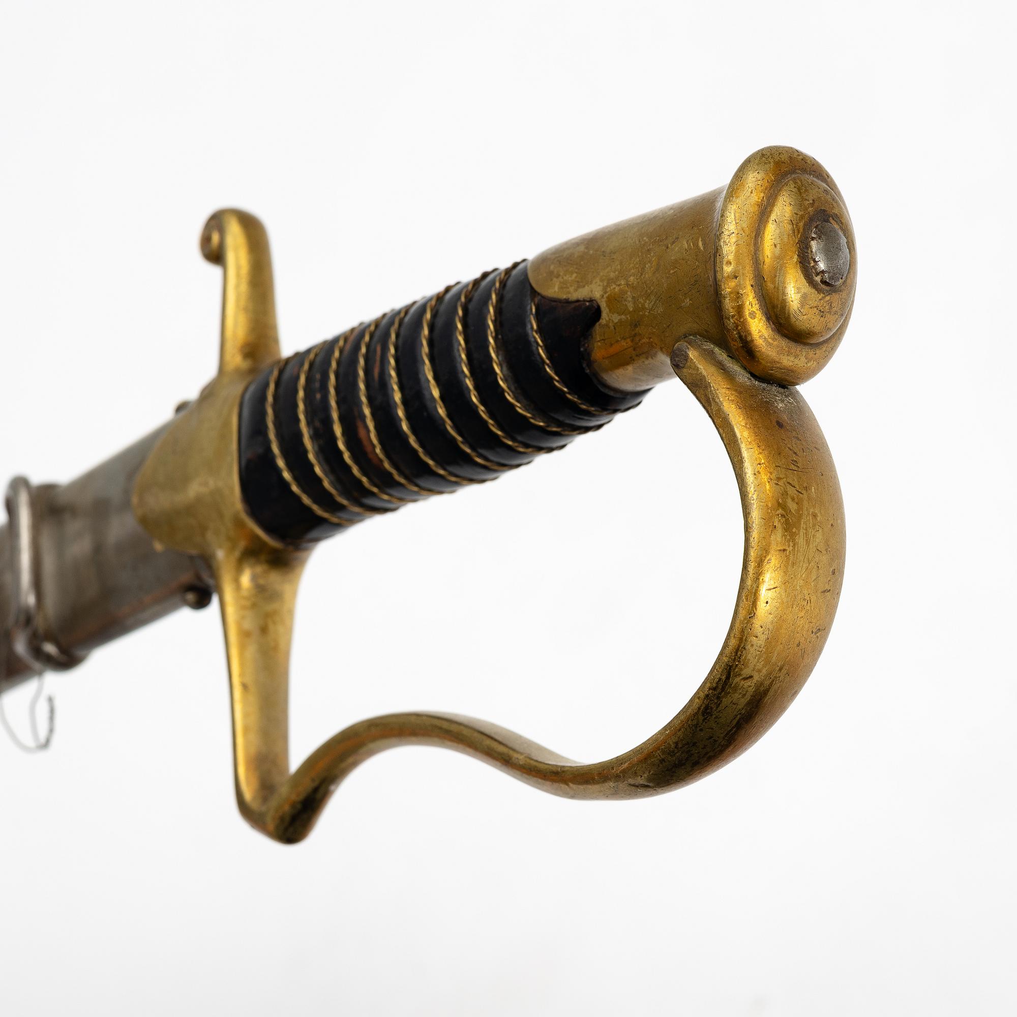 A Swedish artillery saber 1889 pattern with scabbard.