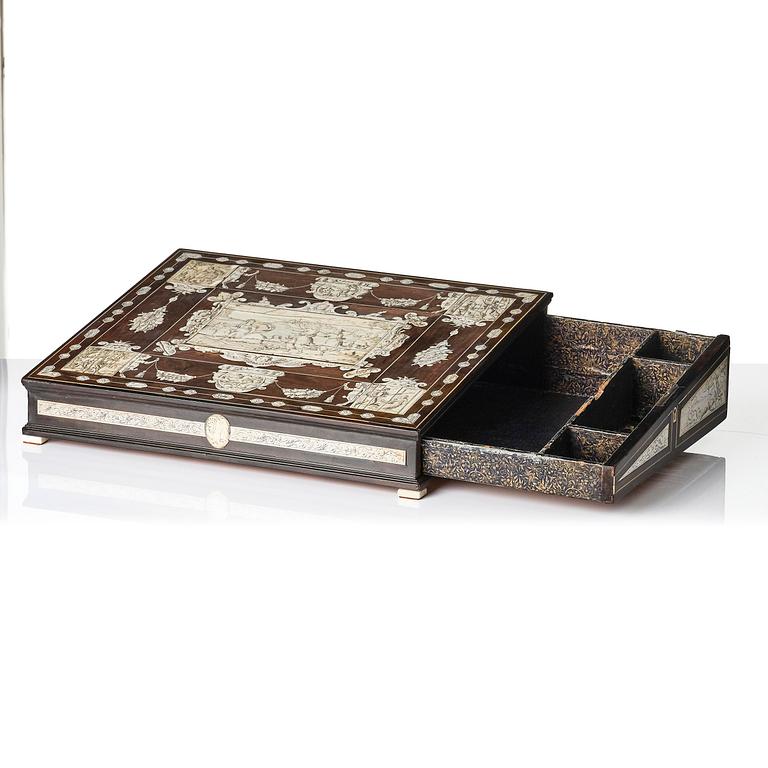 A Neopolitan ebony, rosewood and engraved ivory writing box from the circle of Iacopo Fiamengo, first part 17th century.