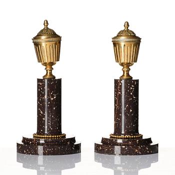 A pair of late Gustavian Swedish porphyry and ormolu cassolettes.