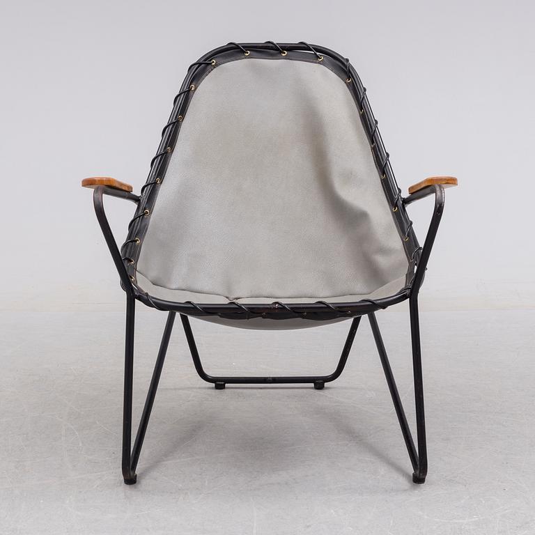 A 1950s easy chair.