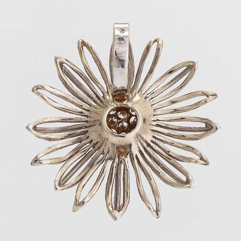 A 14K white gold flower pendant, diamonds totalling approximately 0.12 ct.