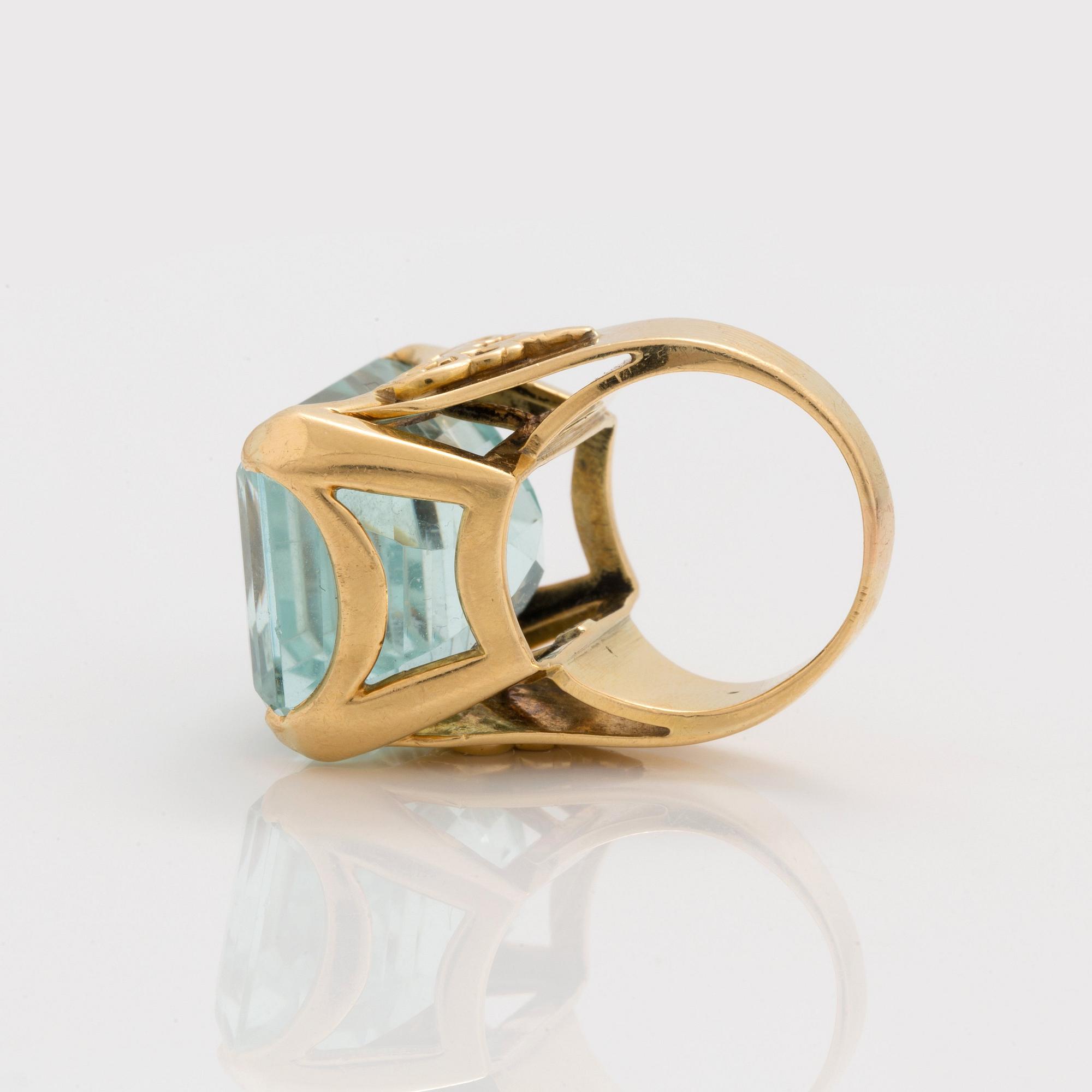 A circa 45.00 ct step cut aquamarine ring.