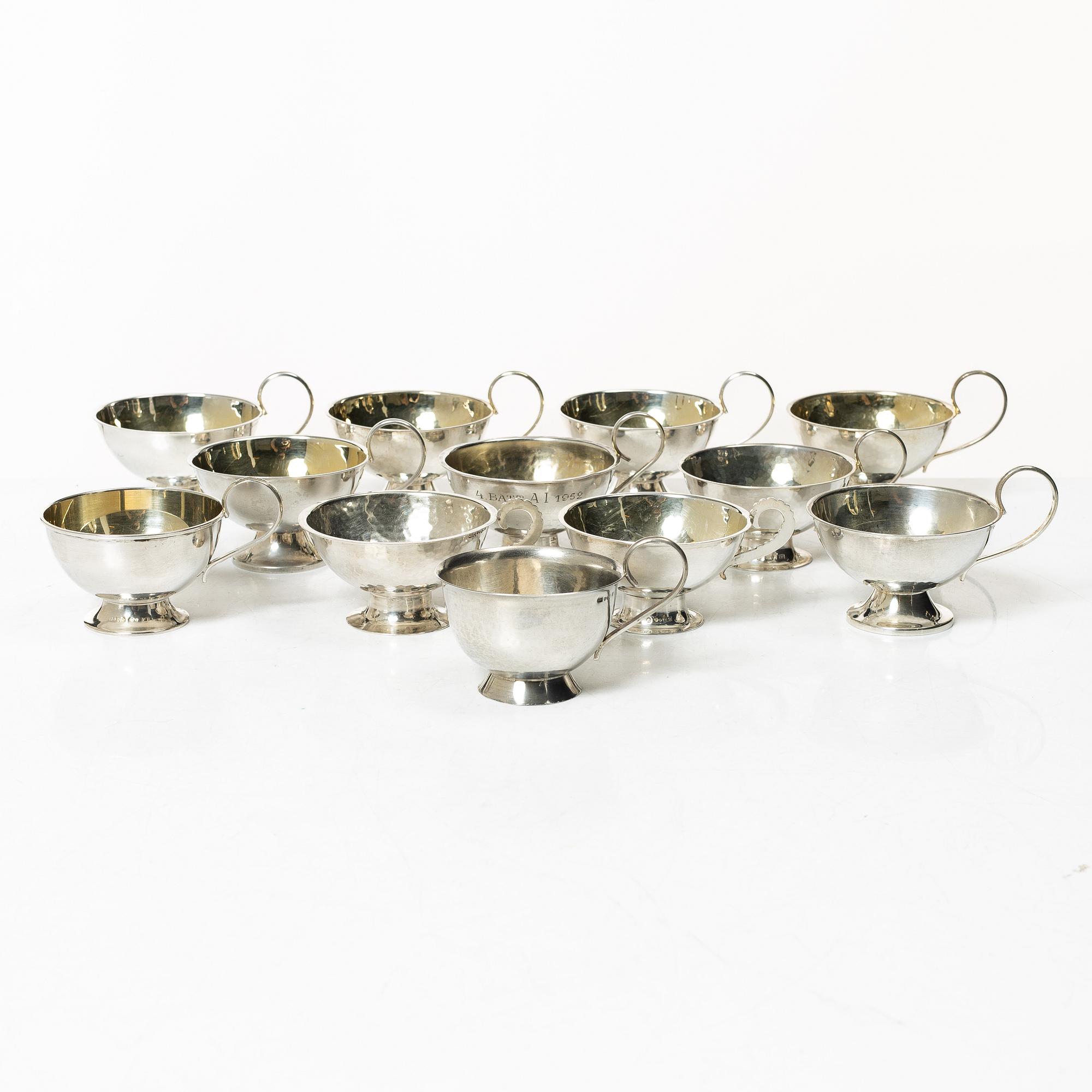 Twelve silver mugs, Stockholm, Eskilstuna and Gothenburg, 1950-91.