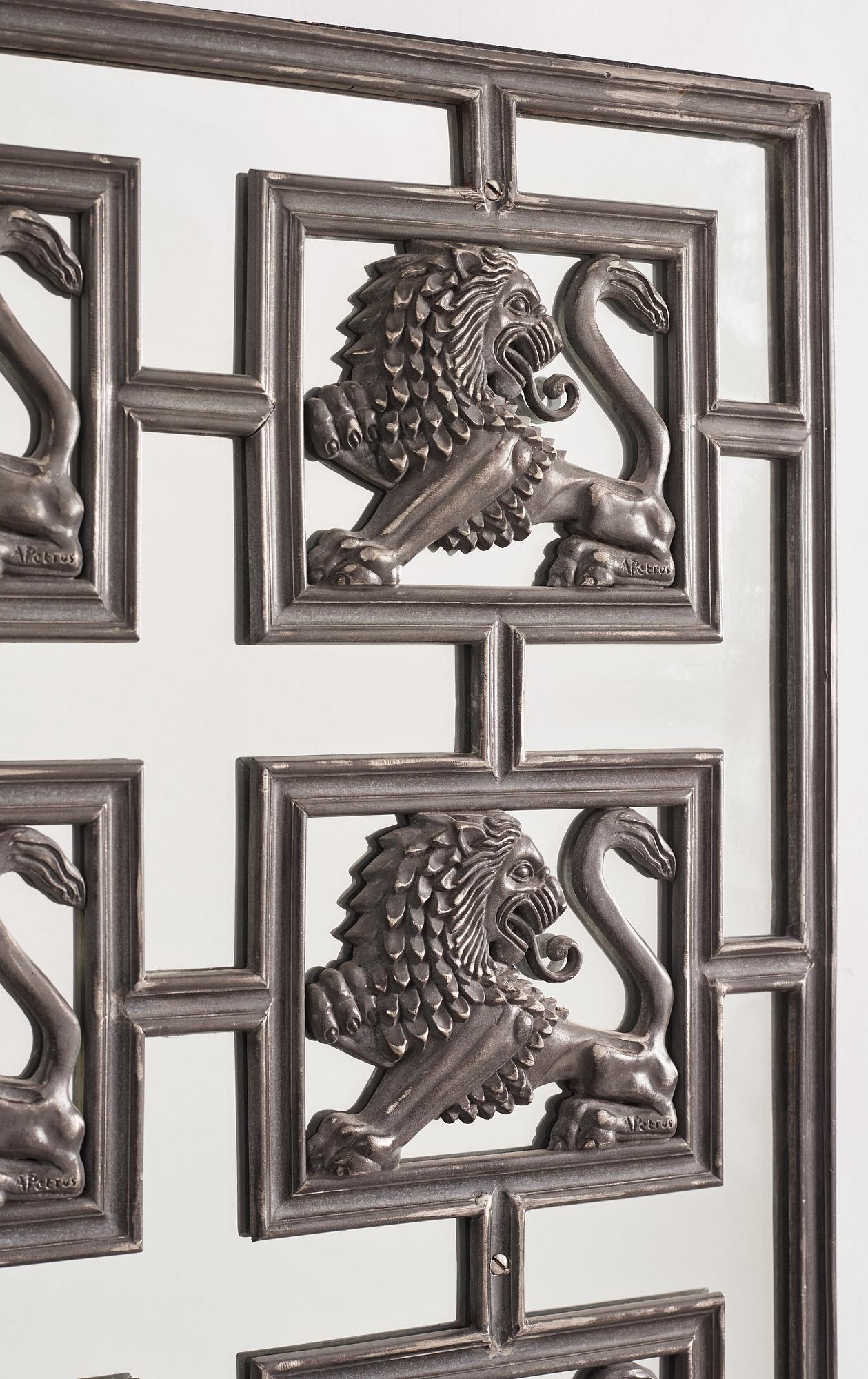 Uno Åhrén & Anna Petrus, a pewter mirror,  Svenskt Tenn, Stockholm, model 516, designed in 1927.