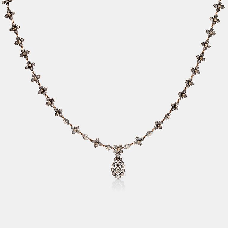 A rose-cut diamond necklace.