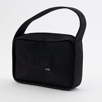 Gucci, a black satin handbag.