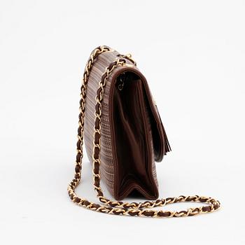 CHANEL, a brown canvs and leather crossbody bag.