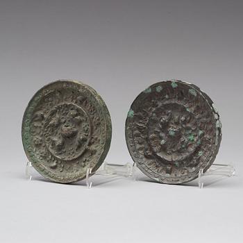 Two bronze mirrors with mythical animals,  Tang dynasty (618–907).