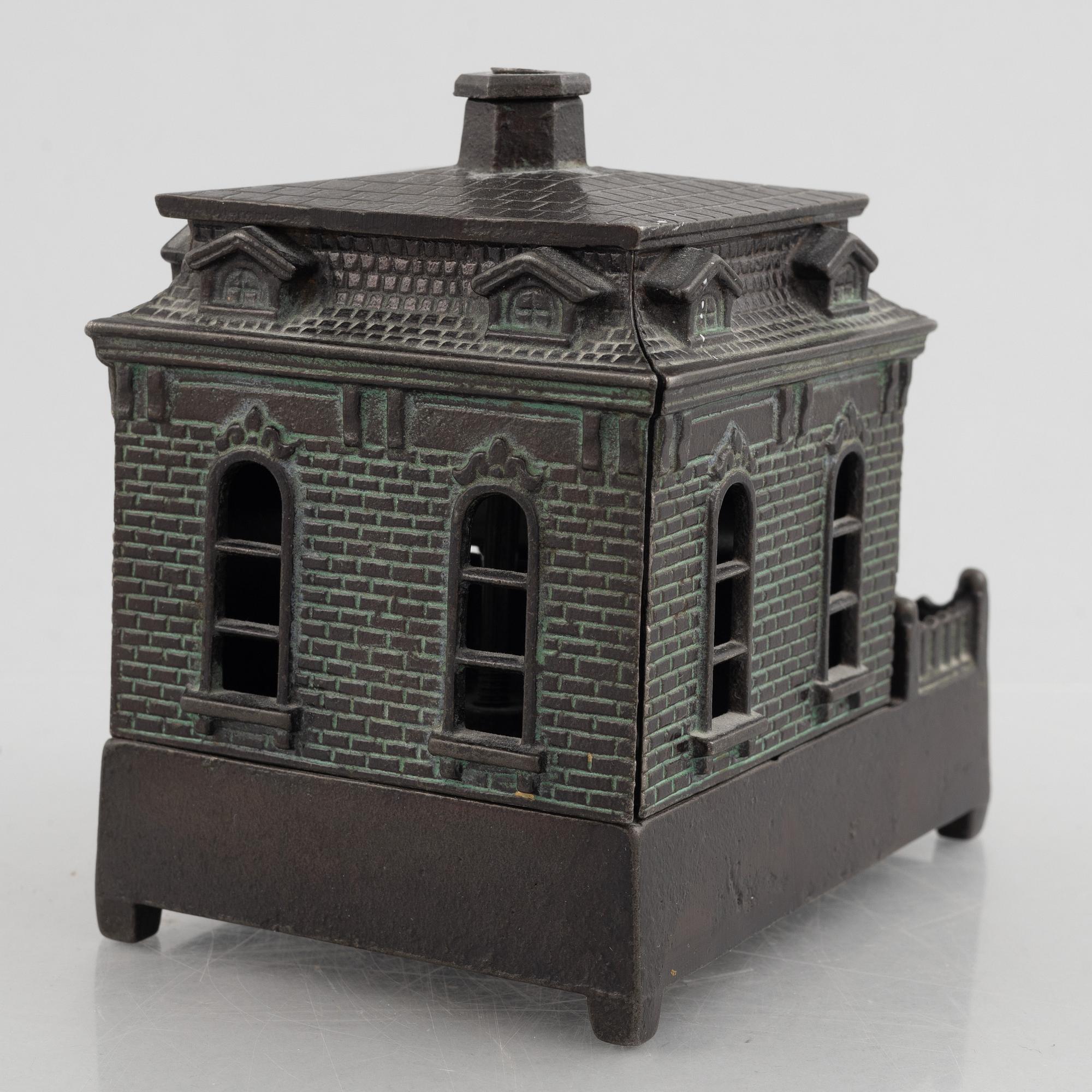 A mechanical bank, late 19th century, probably by Judd Manuf. Comp.