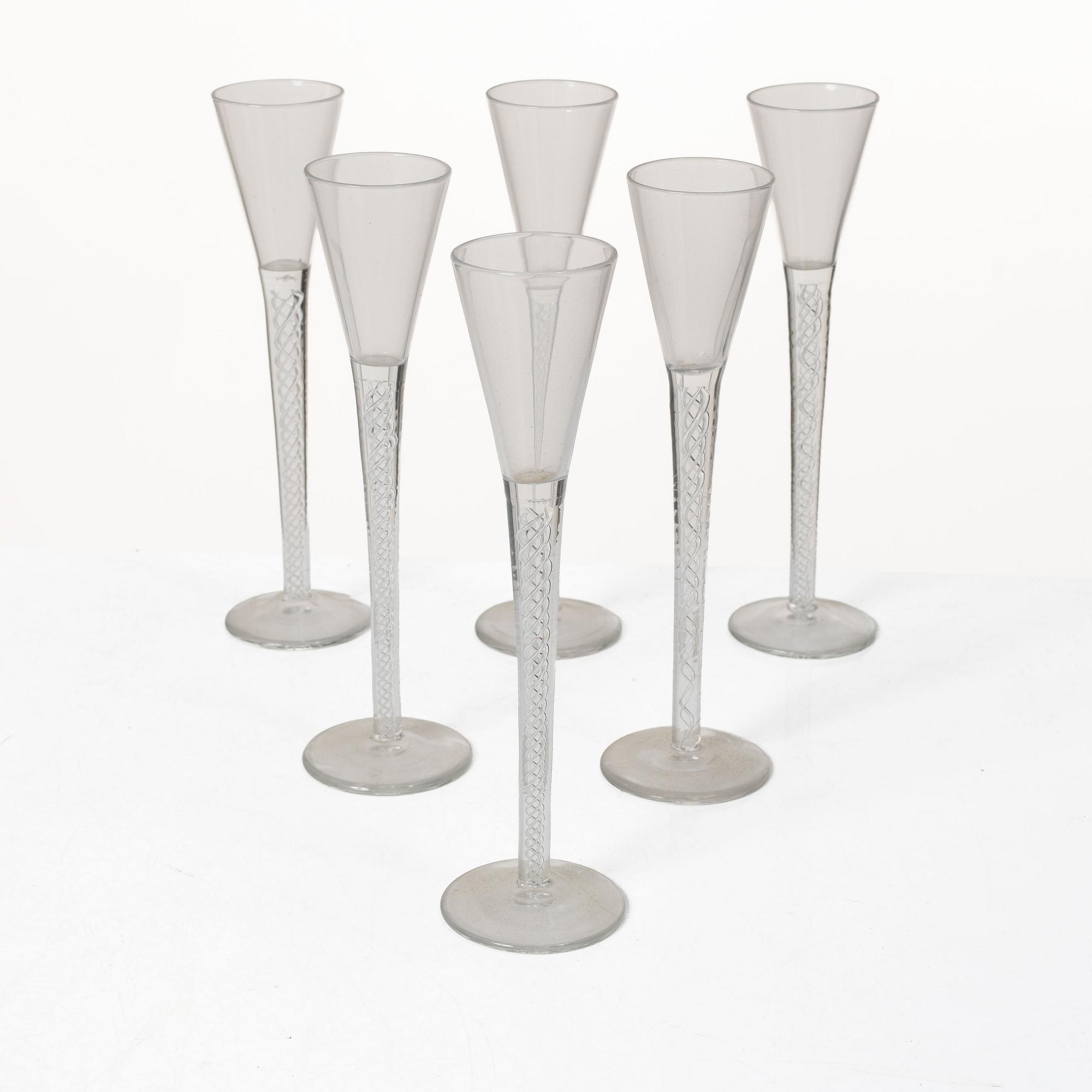 A set of six glasses with spiral stems, around 1900.