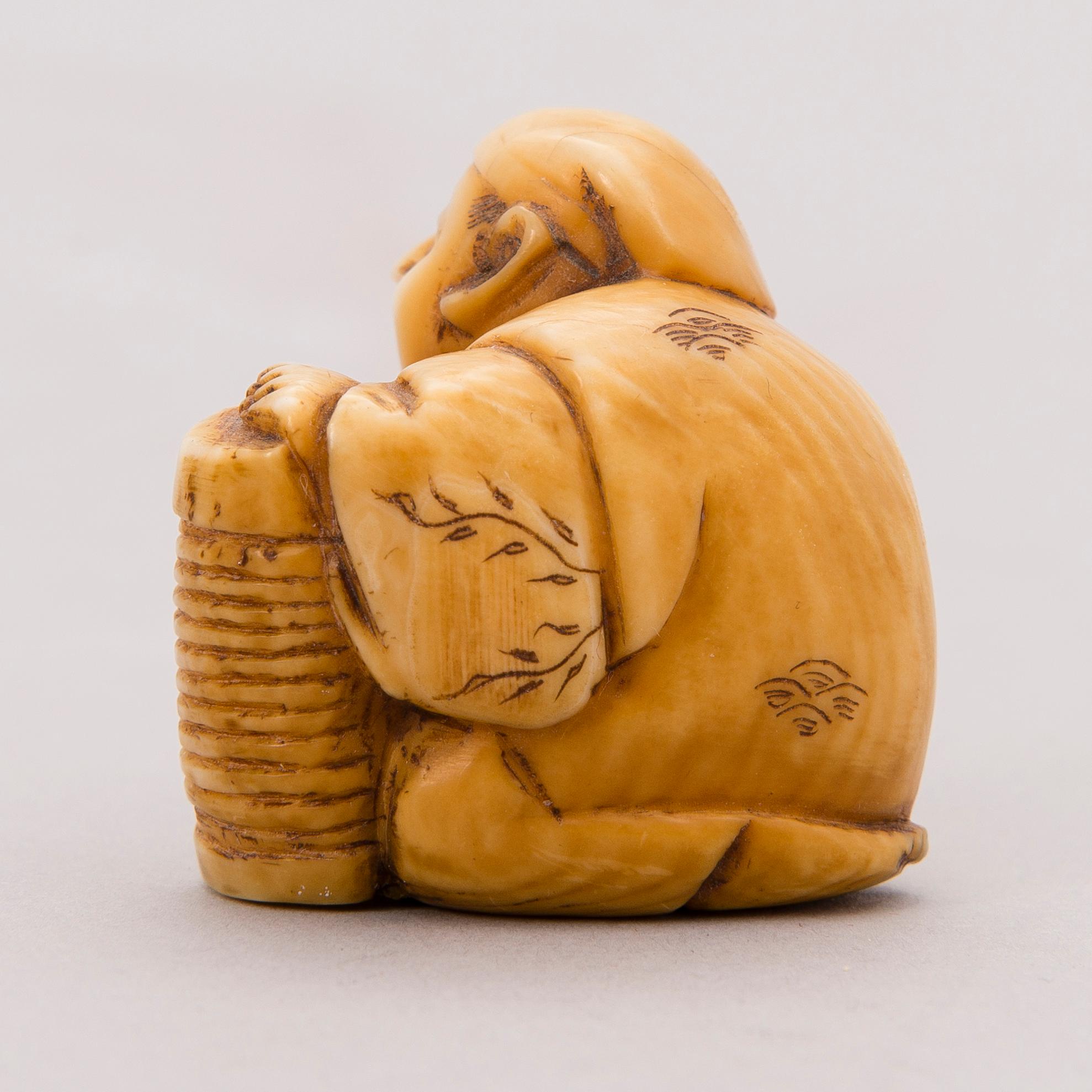 A 19th century Japanese bone netsuke.