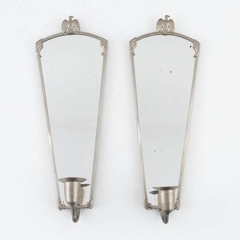 A pair of pewter sconces, 1920's/30's.