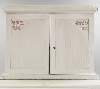 A early 19th century Gustavian cupboard.