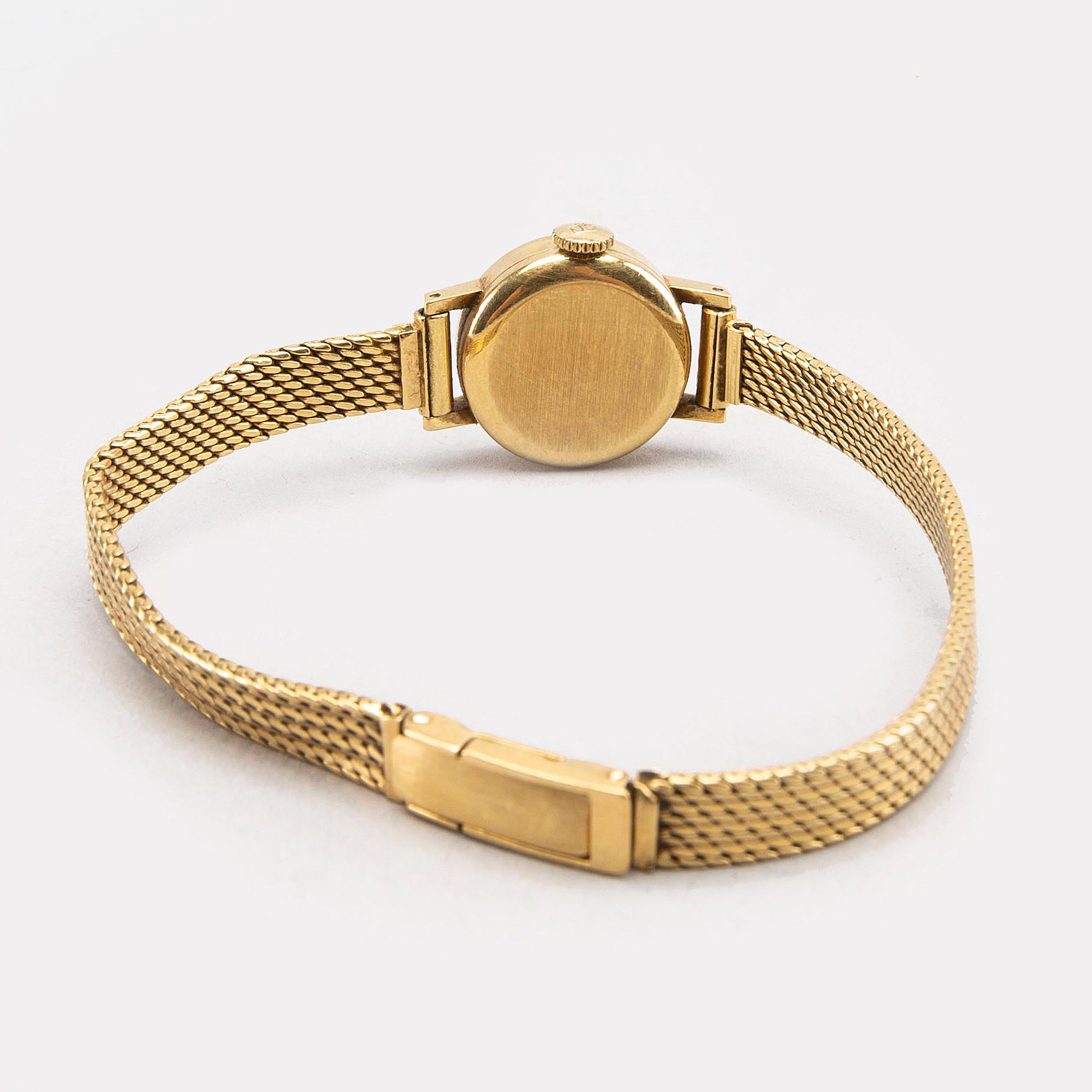 Tissot saphir gold watch discount