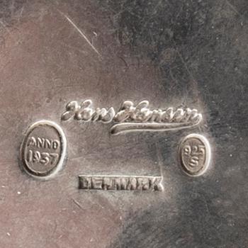A 20th century Danish salter mark of H Hansen 1937 and two unmarked candlesticks total weight 151 gr.