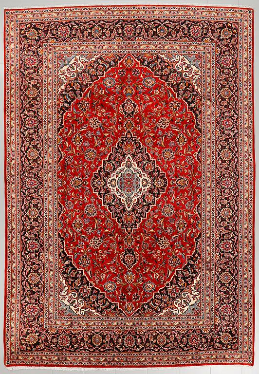 A Keshan rug, 345 x 236 cm.