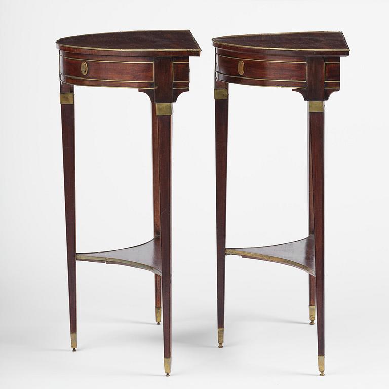 A pair of late Gustavian mahogany consoles in the manner of A. Lundelius, Stochkolm, late 18th century.