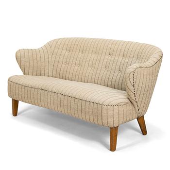 Flemming Lassen, a sofa, manufactured by Asko 1952-1956.