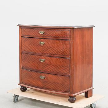 An early 1900s mahogany dresser.