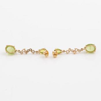Earrings, Mandelstam, 18K gold set with cabochon-cut peridots, tourmalines, and brilliant-cut diamonds.