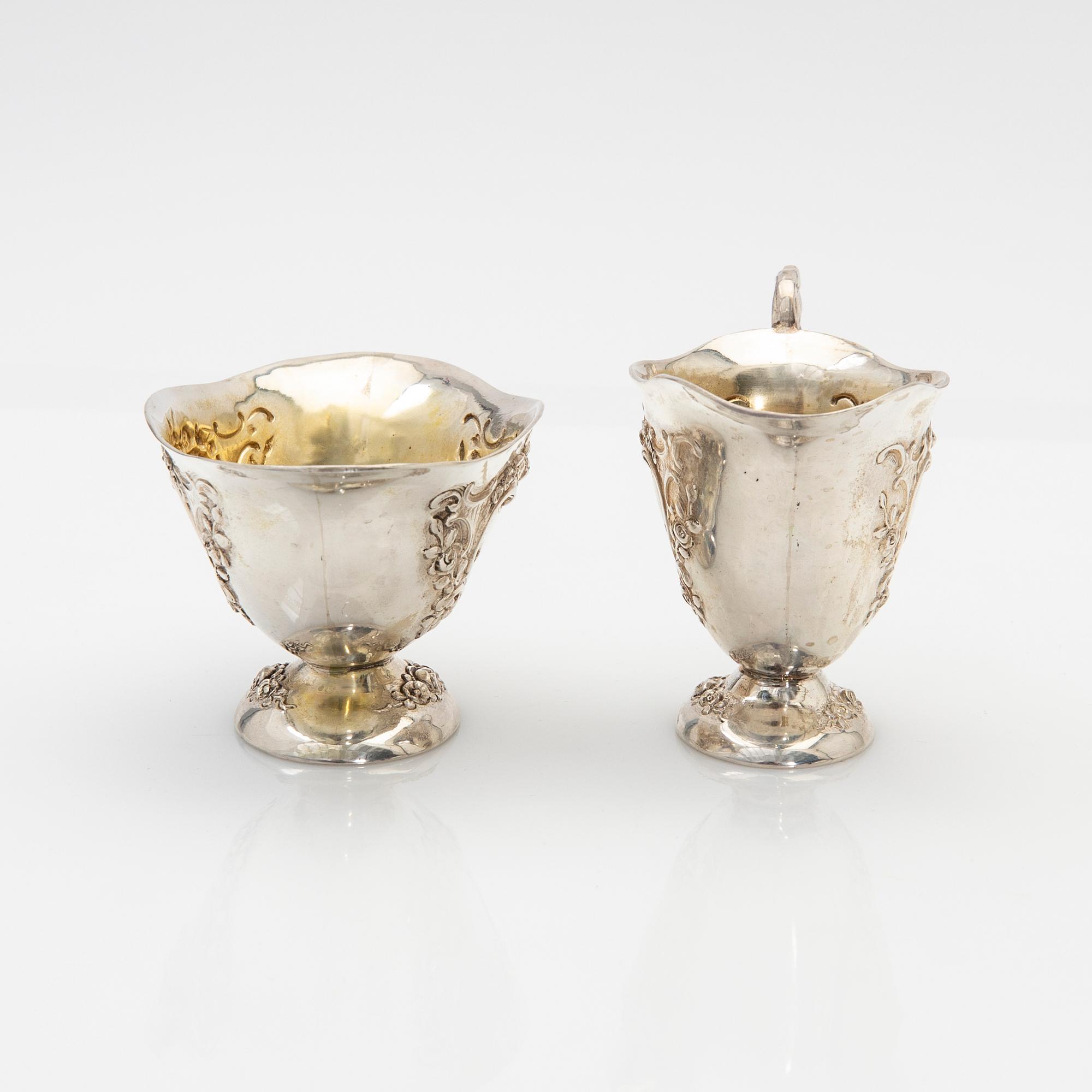 Cream jug and sugar bowl, silver, early 20th century.
