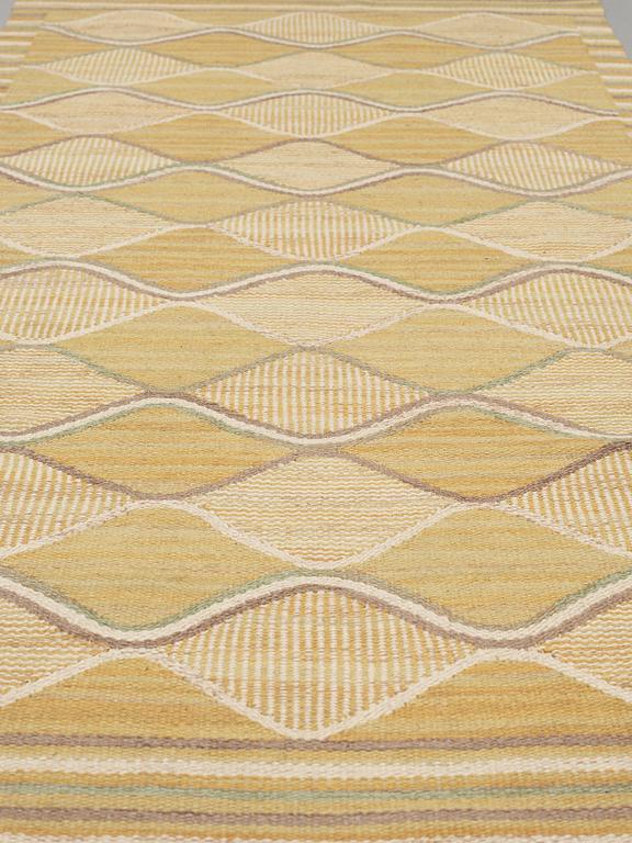 CARPET. "Spättan gul". Flat weave. 213 x 103 cm. Signed AB MMF BN.