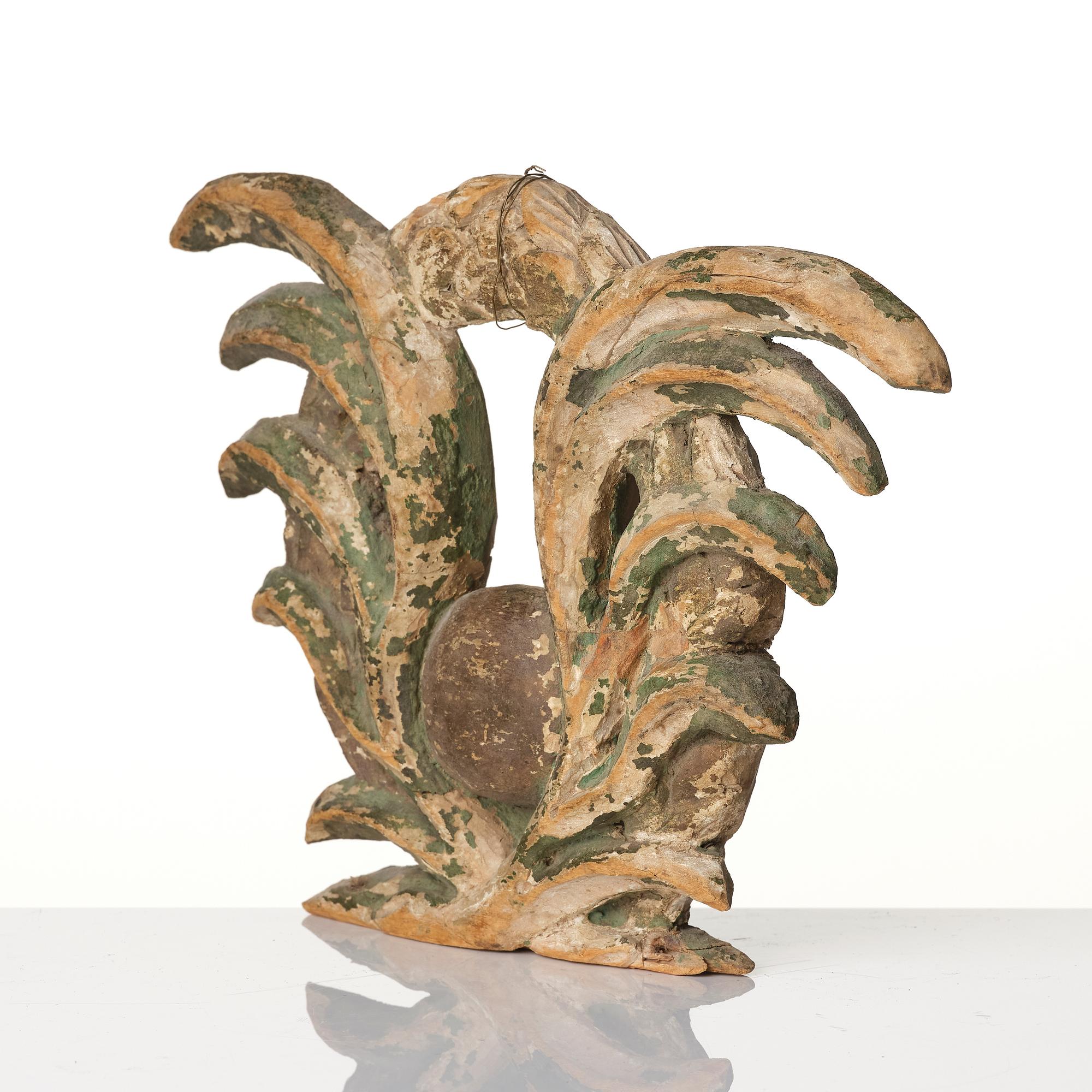 A Swedish baroque carved and painted wreath, later part 17th century.