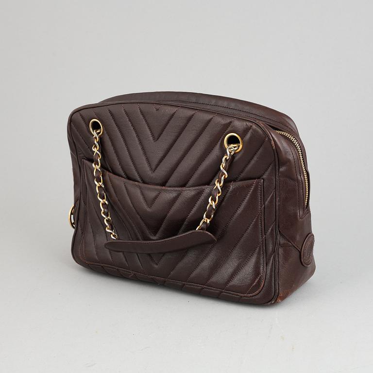 Chanel, a burgundy leather handbag, 1989-91.