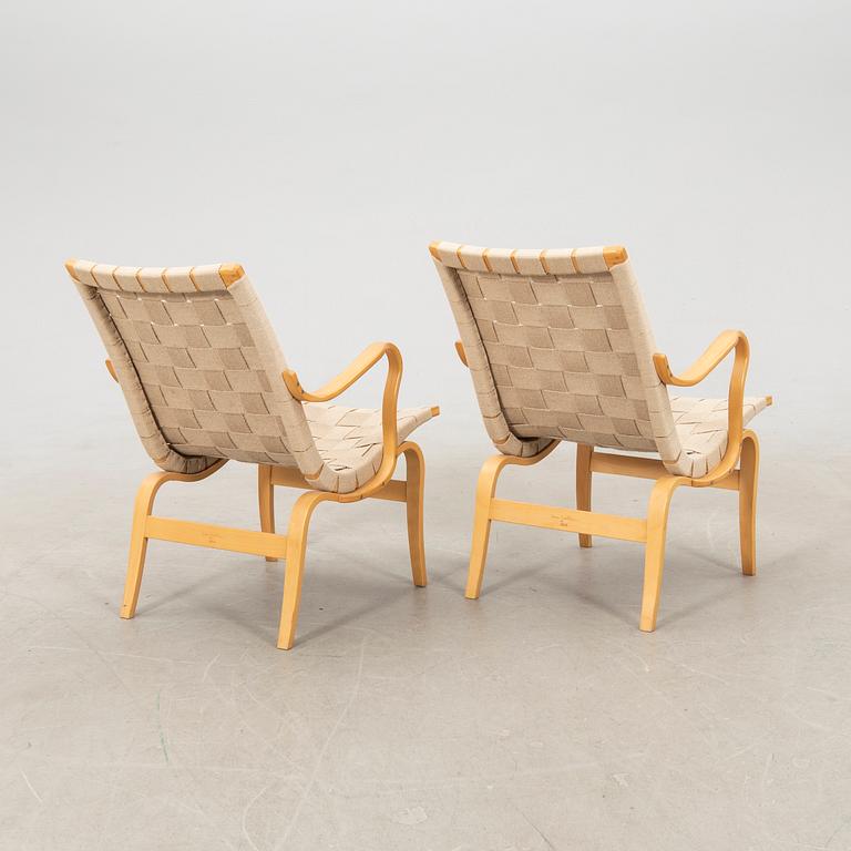 Bruno Mathsson, a pair of "Eva" armchairs for DUX, late 20th century.