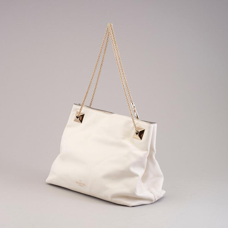 Bag by Valentino.