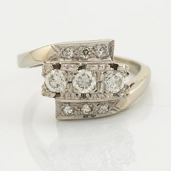 A 14K gold ring set with diamonds.