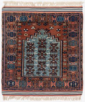 A semi-antique Anatolian rug, c. 127 x 117 cm.