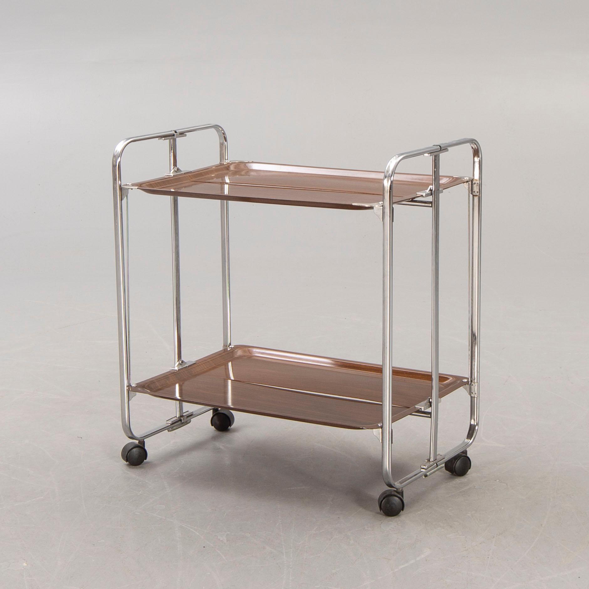 A Gerinol mid 1900s folding serving torlley.