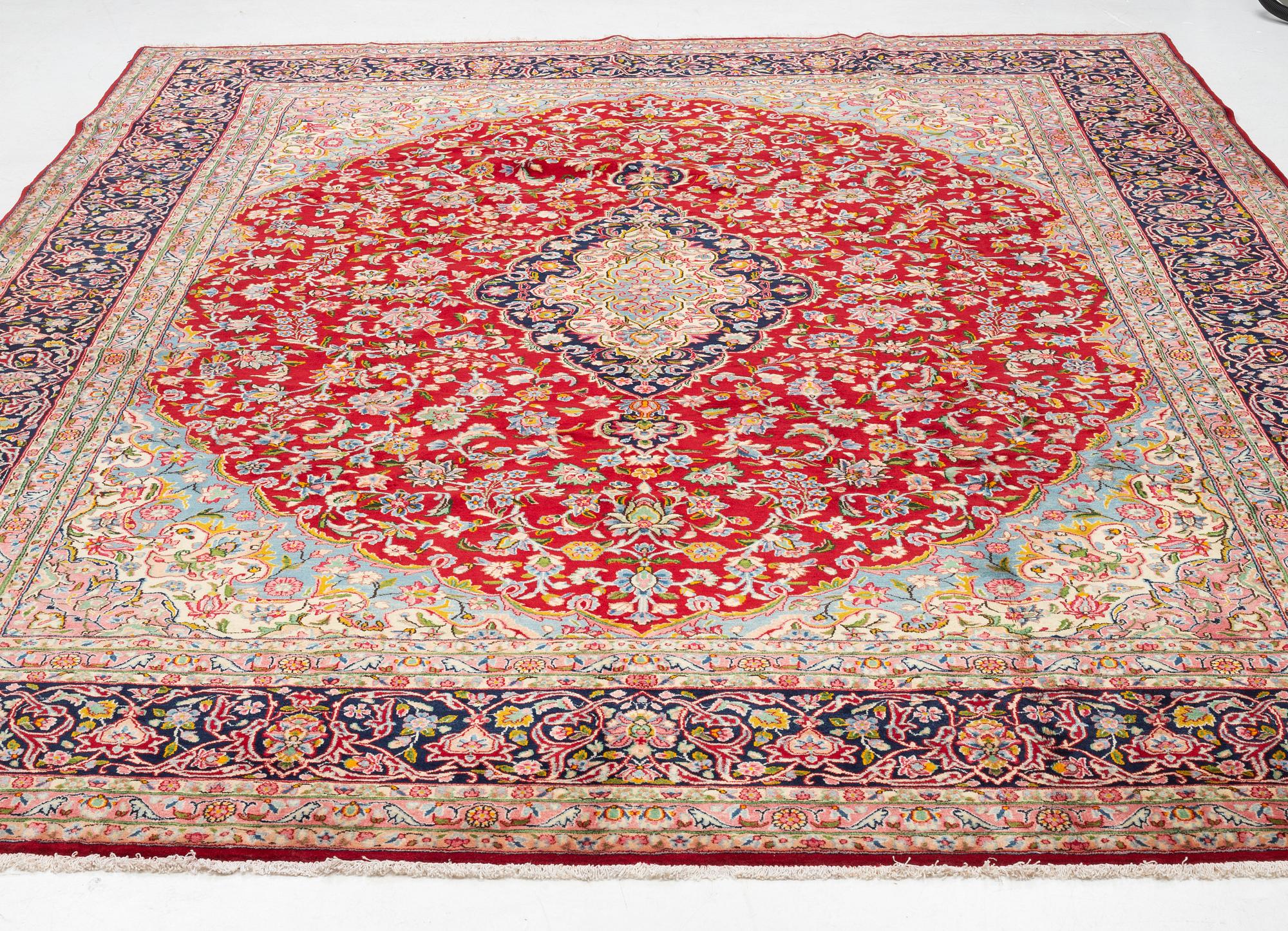 A carpet, semi-antique Kirman, signed, circa 400 x 300 cm.