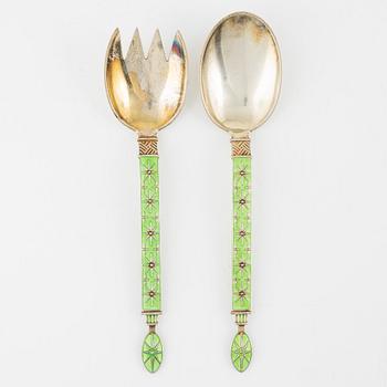 A pair of Norwegian silver-gilt and enamel serving cutlery by J Tostrup, mid 20th Century.