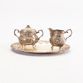 A Swedish 20th century set of three pcs of creamer and sugar-bowl, mark of JL Hultman Stockholm 1954, total weight 422 g.
