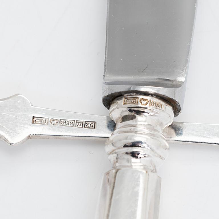 Bestickuppsättning, 24 delar, silver, "Musslan", finska stämplar, Åbo, Tavastehus, Helsingfors 1925-1953.