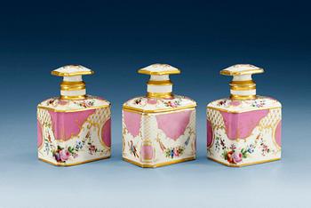 1179. A set with three Russian tea caddies, Kutznetsov 1864-1917. (3).