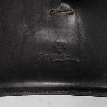 A Philippe Starck 'J Serie Lang' black leather and cast aluminium lounge chair, by Aleph, Italy.