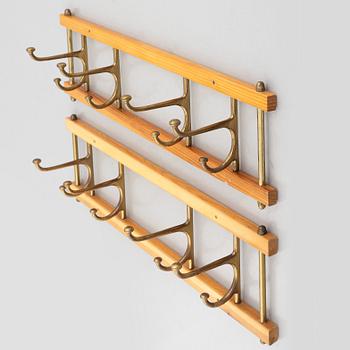A pair of 'Dekorativ' coat hangers, Skoglunds metallgjuteri, Anderstorp, 1950's/60's.