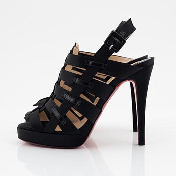 Christian Louboutin, a pair of black silk sandals, size 37 1/2.