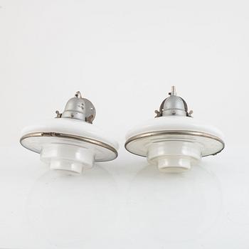 Otto Müller, a pair of 'Sistrah-pendel' wall lamps, Megaphos, first half of the 20th Century.