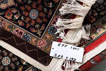 A carpet, Tabriz, part silk, c. 202 x 152 cm.