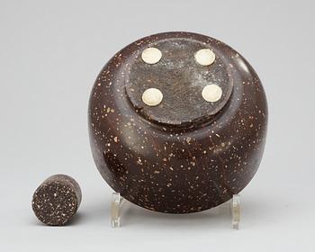 A Swedish 19th century porphyry mortar and pestle.