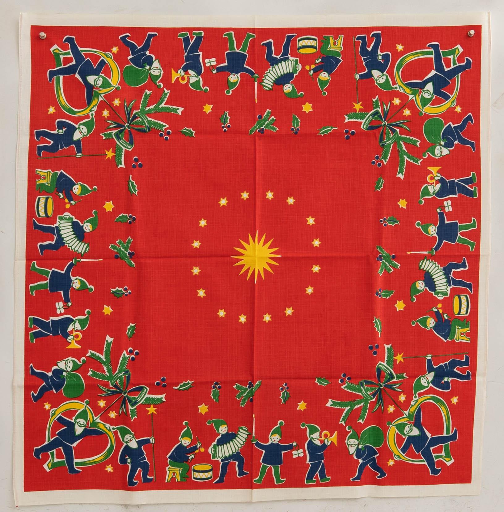 A collection of smaller Christmas tablecloths, runners, and wall hangings, approximately 34 pieces, mid/second half of the 20th century.