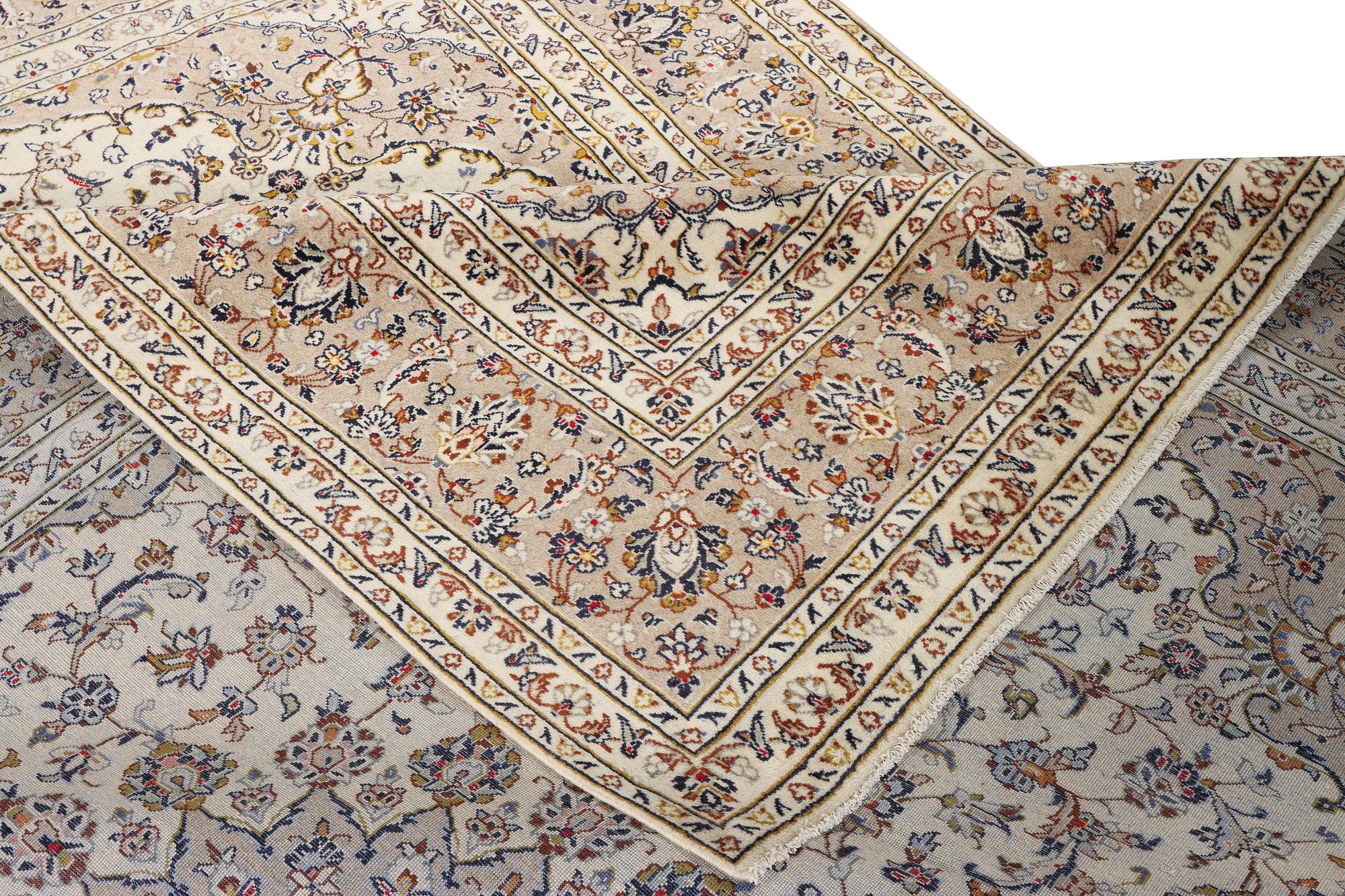 A Keshan carpet, c. 355 x 240 cm.