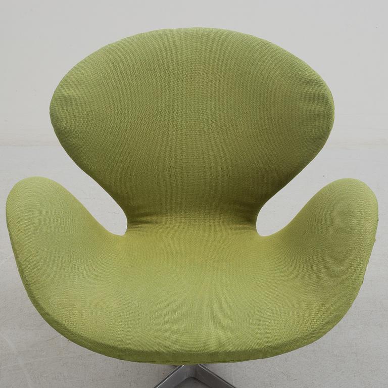 A Arne Jacobsen "Svanen" armchair and stool, second half of the 20th century.