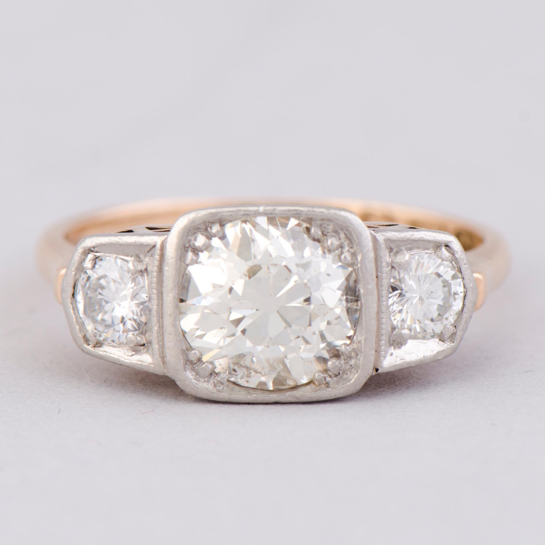 A RING, old cut diamond, brilliant cut diamonds, 14K gold. Westerback, Helsinki Finland 1958.